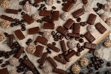 New Year's Eve table full of chocolates for children. Chocolate candy isolated 