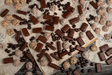 New Year's Eve table full of chocolates for children. Chocolate candy isolated 