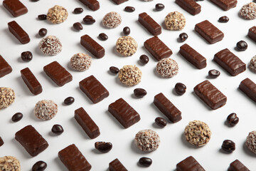 New Year's Eve table full of chocolates for children. Chocolate candy isolated 