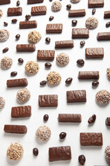 New Year's Eve table full of chocolates for children. Chocolate candy isolated 