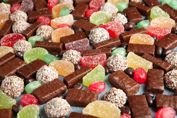 Assortment of delicious chocolate candies background. Chocolate candy isolated 