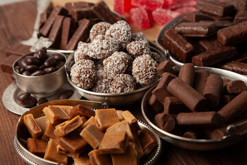 Assortment of delicious chocolate candies background. Chocolate candy isolated 