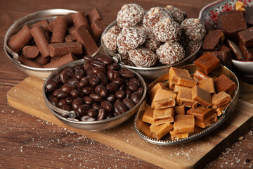 Assortment of delicious chocolate candies background. Chocolate candy isolated 