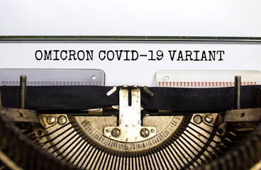 Covid-19 new omicron virus variant symbol. Concept words Omicron covid-19 variant typed on retro...
