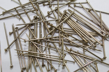 Metal pins with white background