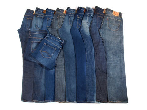 Blue Jeans Brands like Mustang, Levis, Hilfiger and others - isolated on white Background.