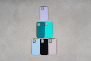 Obraz premium Christmas tree made of silicone cases for smartphone.