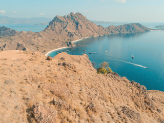 From the top view on Padar Island, we can see many ships are docked and that is very beautiful