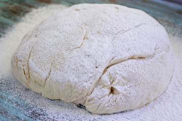 Fresh crude dough mixed and kneaded from wheat flour during baking