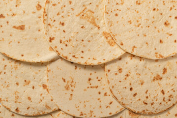 Grilled pitta bread isolated on white background.