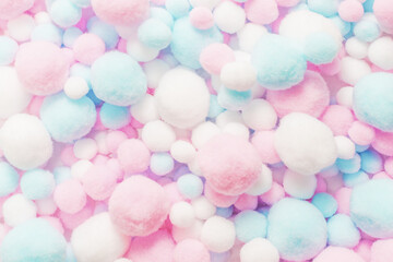 White, pink and blue soft pompons