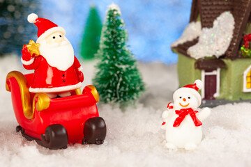 merry christmas greeting card, santa claus and sleigh in the snow, toys