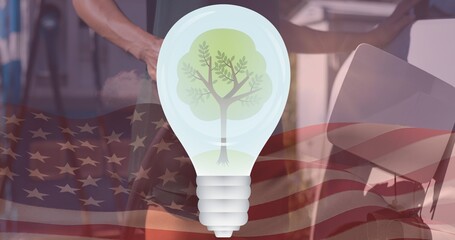 Double exposure of electric bulb over american flag and woman charging electric car - Powered by Adobe