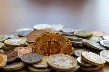 bitcon coin rising in the middle of several coins. cryptocurrency concept