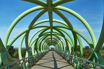 Green metal pedestrian bridge