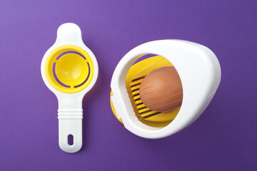 EGG cutter, seperator on a purple background.