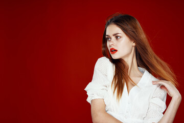 Naklejka premium attractive woman red hair red lips posing glamor