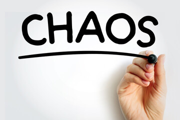 CHAOS underlined text with marker, concept background