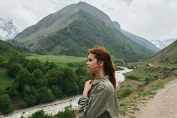 Fototapeta premium woman hiker mountains landscape travel freedom fresh air