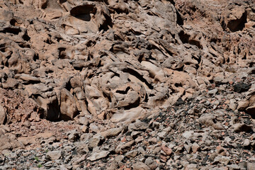 the beautiful whimsical texture of the rock as a result of weathering. Stone background.