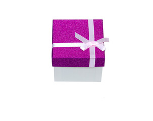 Gift box for gifts. celebration concept. White box with a lilac cap and bow. On an isolated white background.