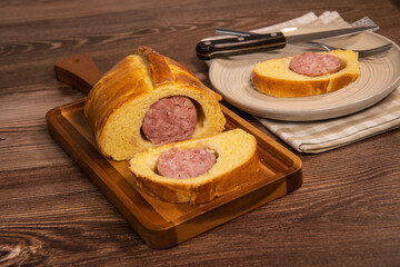 Lyonnais brioche baked with sausage style rustic, Morteau sausage
