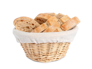Cut delicious ciabatta in wicker basket isolated on white