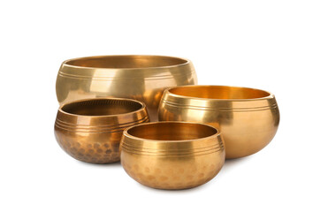 Four Tibetan singing bowls on white background