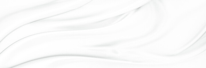 White gray satin texture that is white silver fabric silk panorama background with beautiful soft...