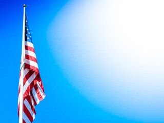 Material flag of the United States of America, sky in background