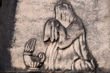grieving veiled next to a flame, Alaró Cemetery, Mallorca, Balearic Islands, Spain