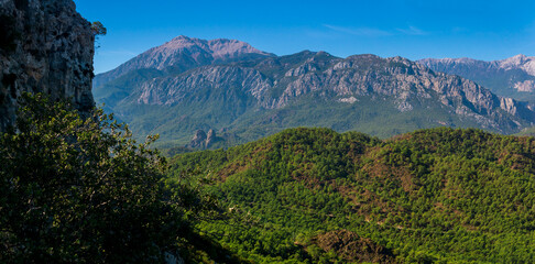 Mediterranean mountain landscape on the southern coast of Turkey with Mount Tahtali (Lycian Olympus) in the distance