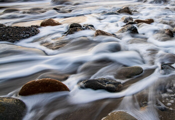 water flowing over rocks