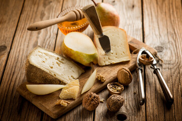 traditional italian cheese with pear honey and nuts