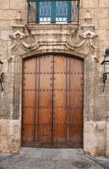 Old wooden doors are part of the Office of History of the City building in Old Havana.