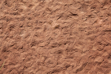 Texture in terracotta tones. Brown stone close up, abstract background