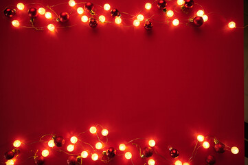 Christmas decoration card and illustration for Holliday red background with pinecones lights for corporate or personal invitations 