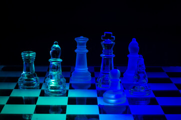 Glass chess on glass board	