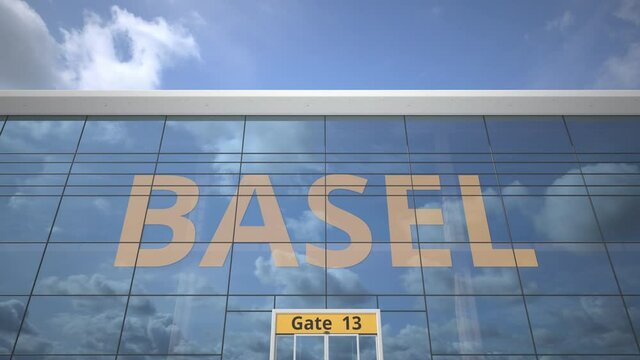BASEL text revealed with landing airplane on airport building