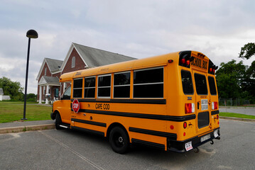 Onset, USA, 23.07.2019. Yellow school bus on parking lot in Onset, Massachusetts, USA.