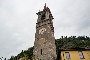 Fototapeta na wymiar View on a bell tower in Varenna on Lake Como, Lombardia - Italy
