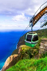 Fototapete Rund Achadas da Cruz cable car in Madeira island, western part. Spectacular sea and rocky mountains scenery, popular tourist attraction © Freesurf