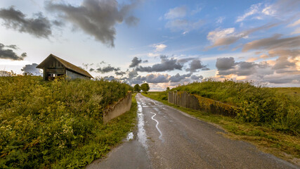 Road passage through old sea dike