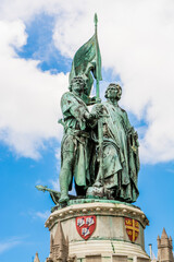 Statue of Jan Breydel and Pieter de Coninck in The Markt or Market Square, Bruges, West Flanders, Belgium.