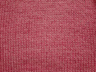 Texture of pink fabric, close up of wool structure, wallpaper background.