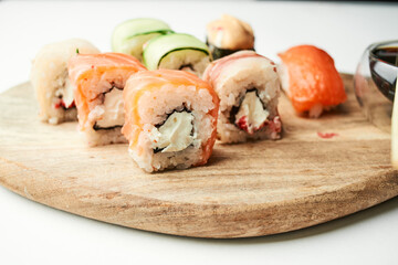 sushi rolls wood board japanese cuisine restaurant