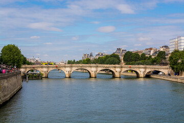 Fototapeta na wymiar Pont Neuf Bridge over the Seine with the Louvre behind, Paris, France.