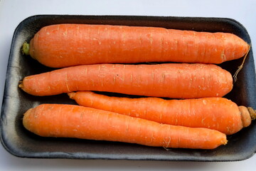 Close-up of a pile of orange carrots in a market, Sofia, Bulgaria  