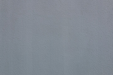 Abstract background from rough old dark gray plaster.