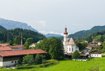 Fototapeta na wymiar Church Sankt Michael. Village Sachrang in the Chiemgau in the Bavarian alps. Europe, Germany, Bavaria